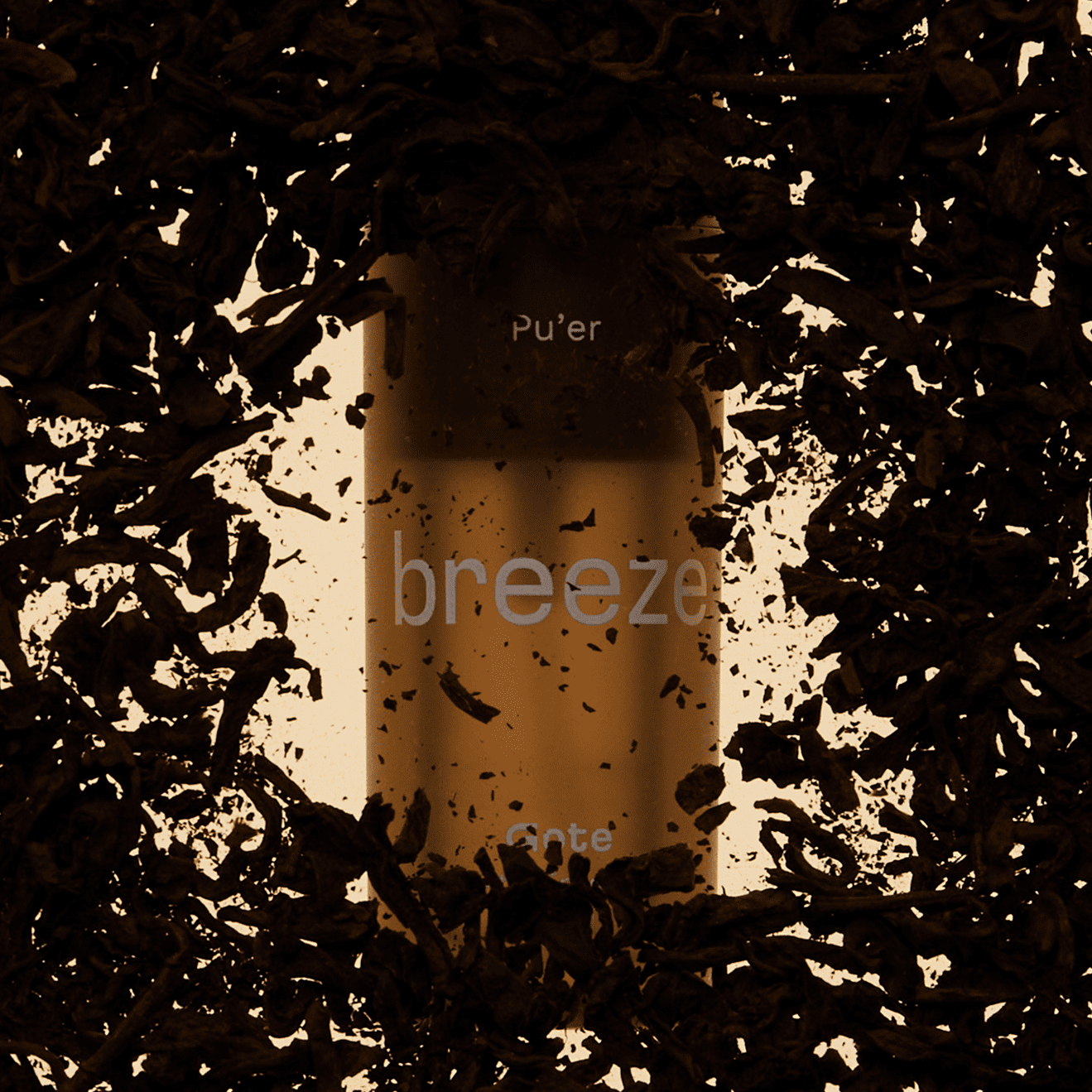 Bottle labeled 'Puér breeze' surrounded by tea leaves
