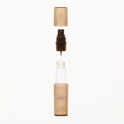 Skincare serum bottle with pump on a white background